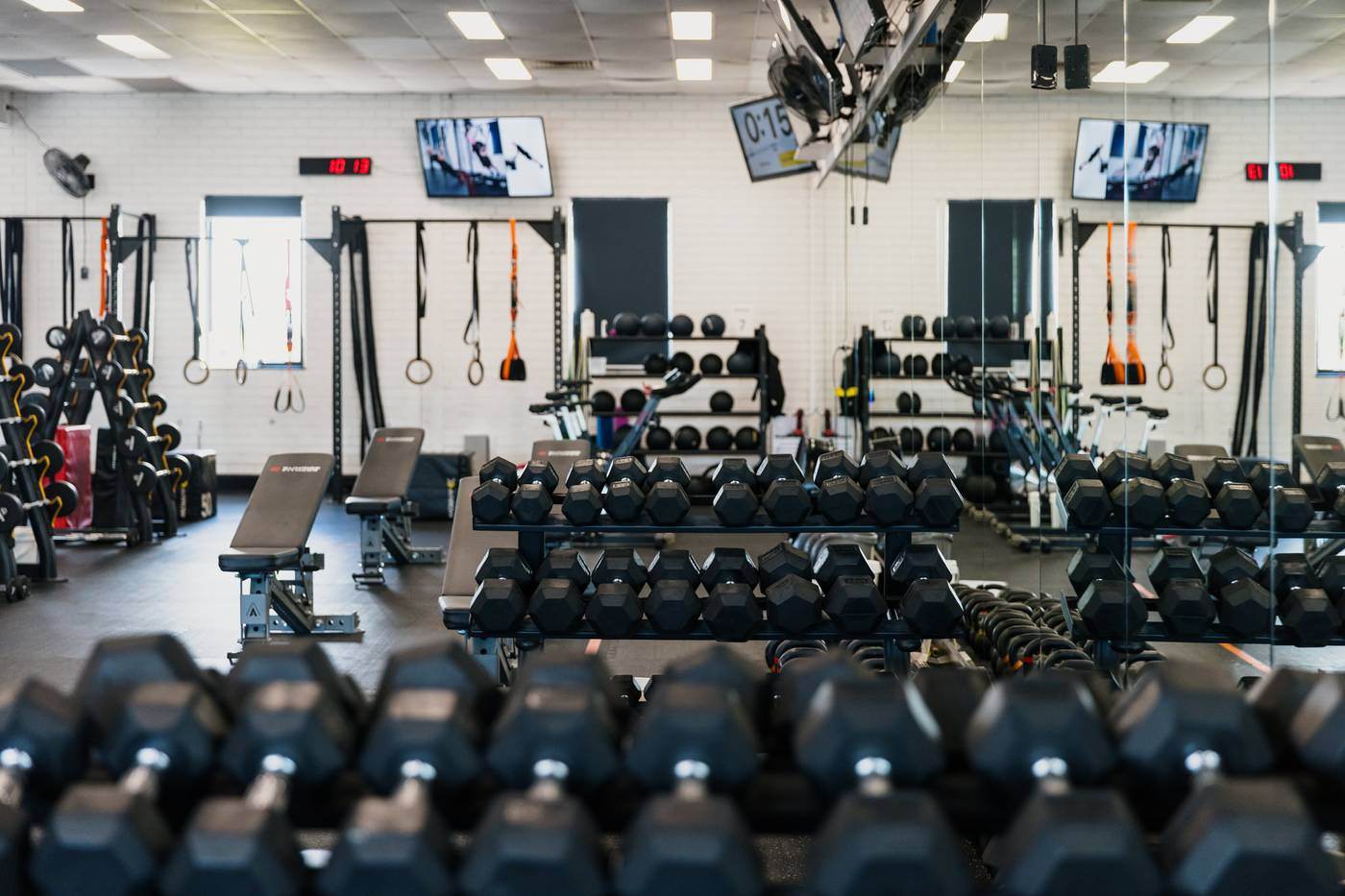 Rows of dumbbells racked and ready